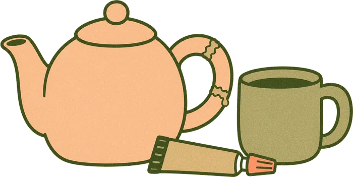 Mended teapot, mug of tea and a tube of glue