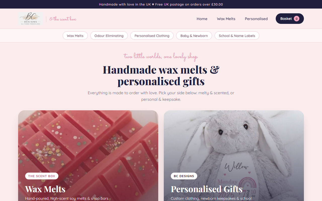 BC Designs homepage with wax melts and personalised gifts hero cards, blush pink palette, and navy header